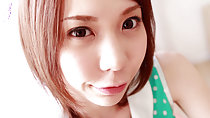 Auburn short hair framing her cute face