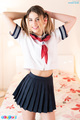 Kristen scott in kogal uniform arms raised hair in pigtails