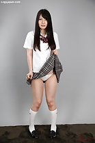 Student raising hem of dress exposing panties wearing shoes and socks