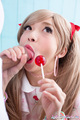 Rika mari sucking hard cock looking up holding lollipop