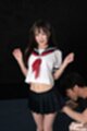 Kogal in uniform arms raised