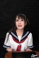On her knees wearing kogal uniform looking up